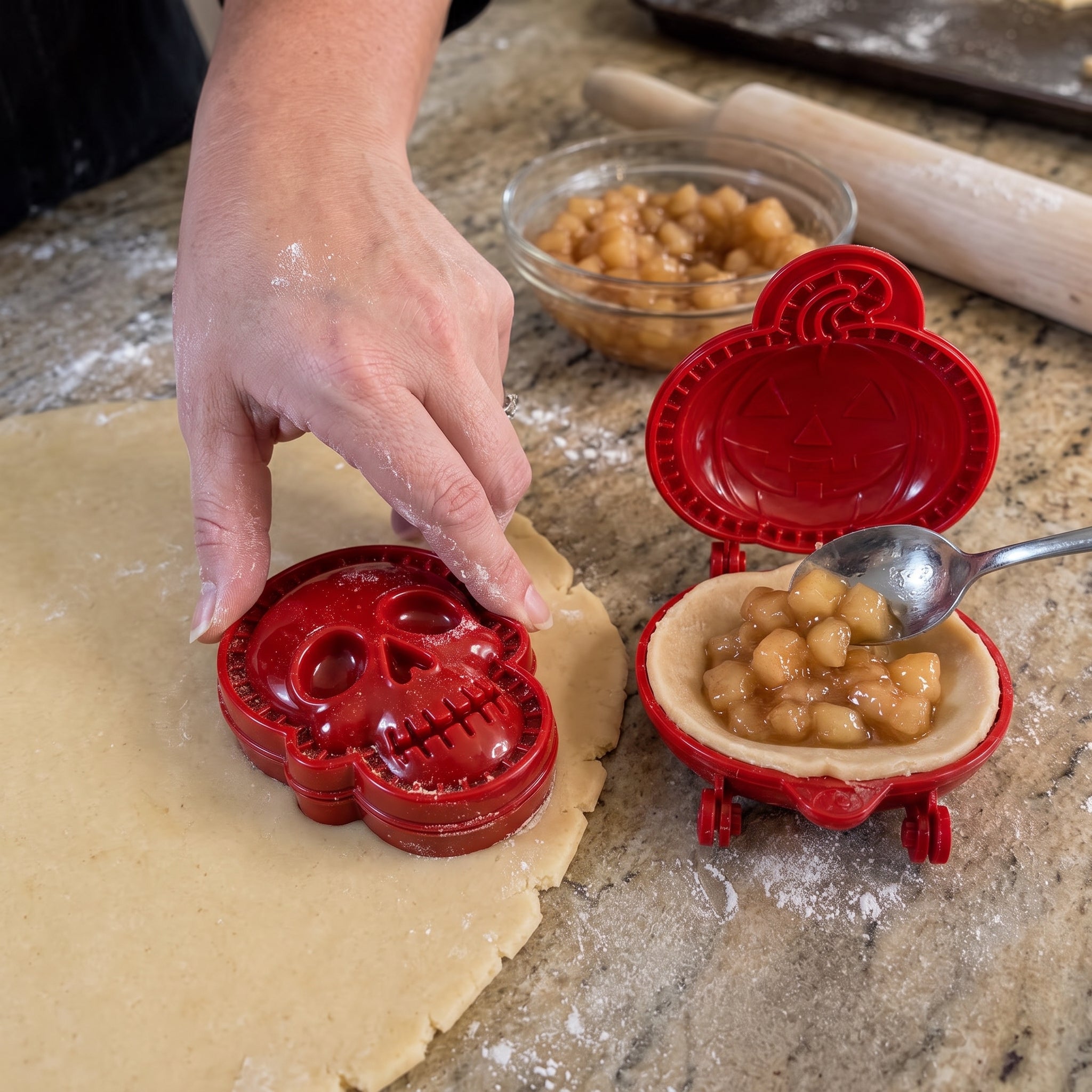 Open Halloween pie mold with filling and dough